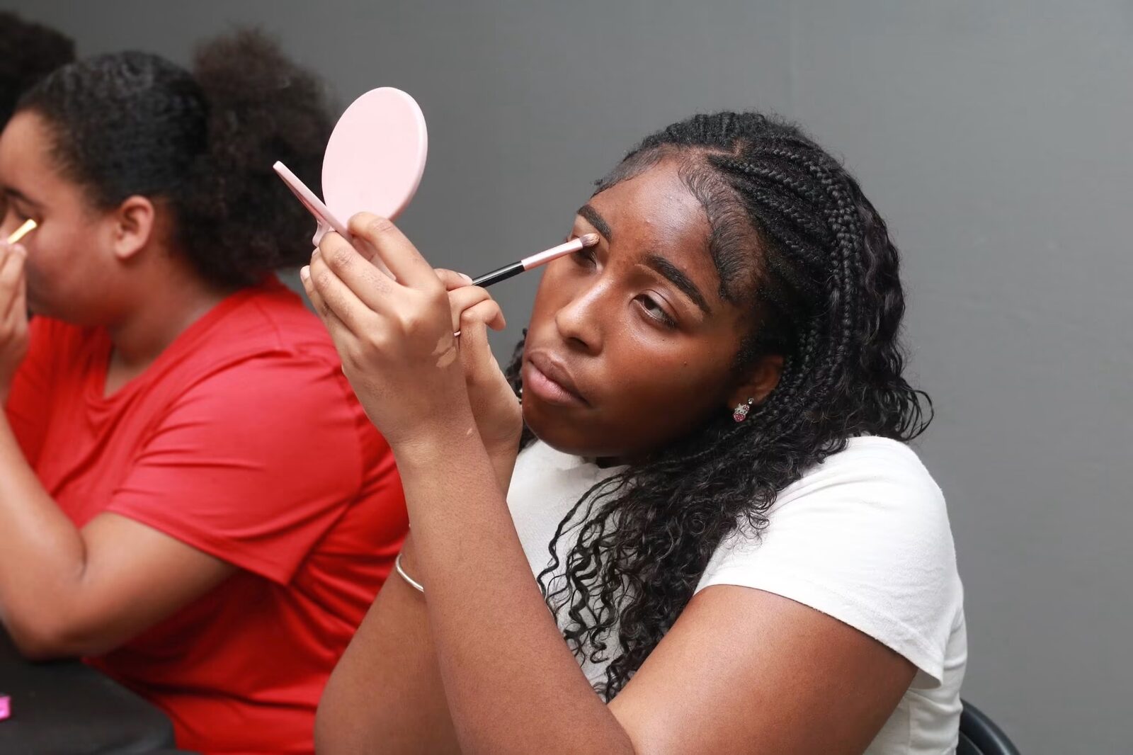Summer academy student practicing stage makeup