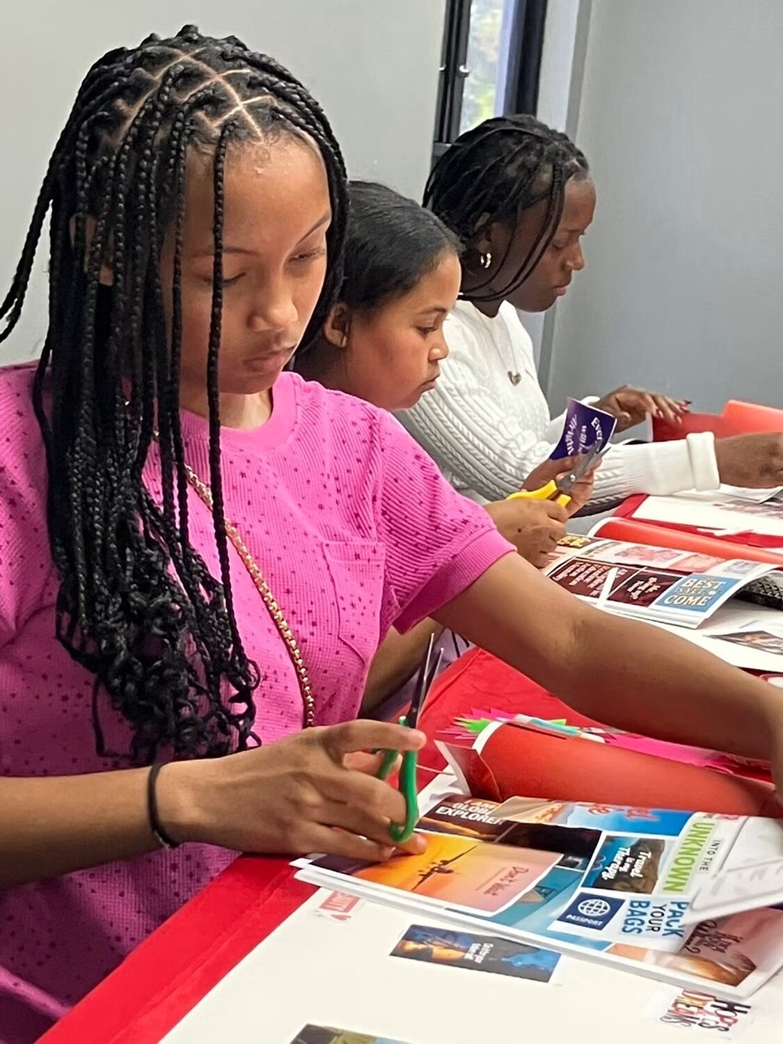 Students building vision boards together in a workshop